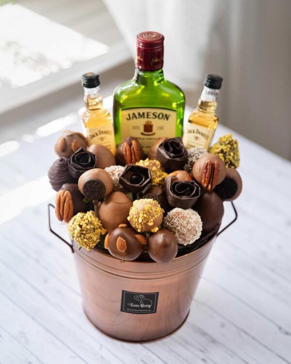 chocolate strawberry arrangements with alcohol bottle