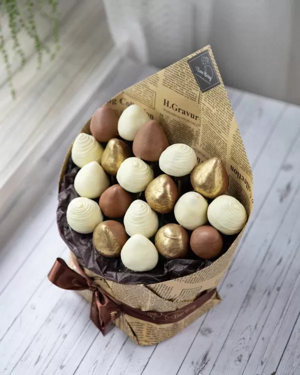 bouquet of gold leaf covered strawberries