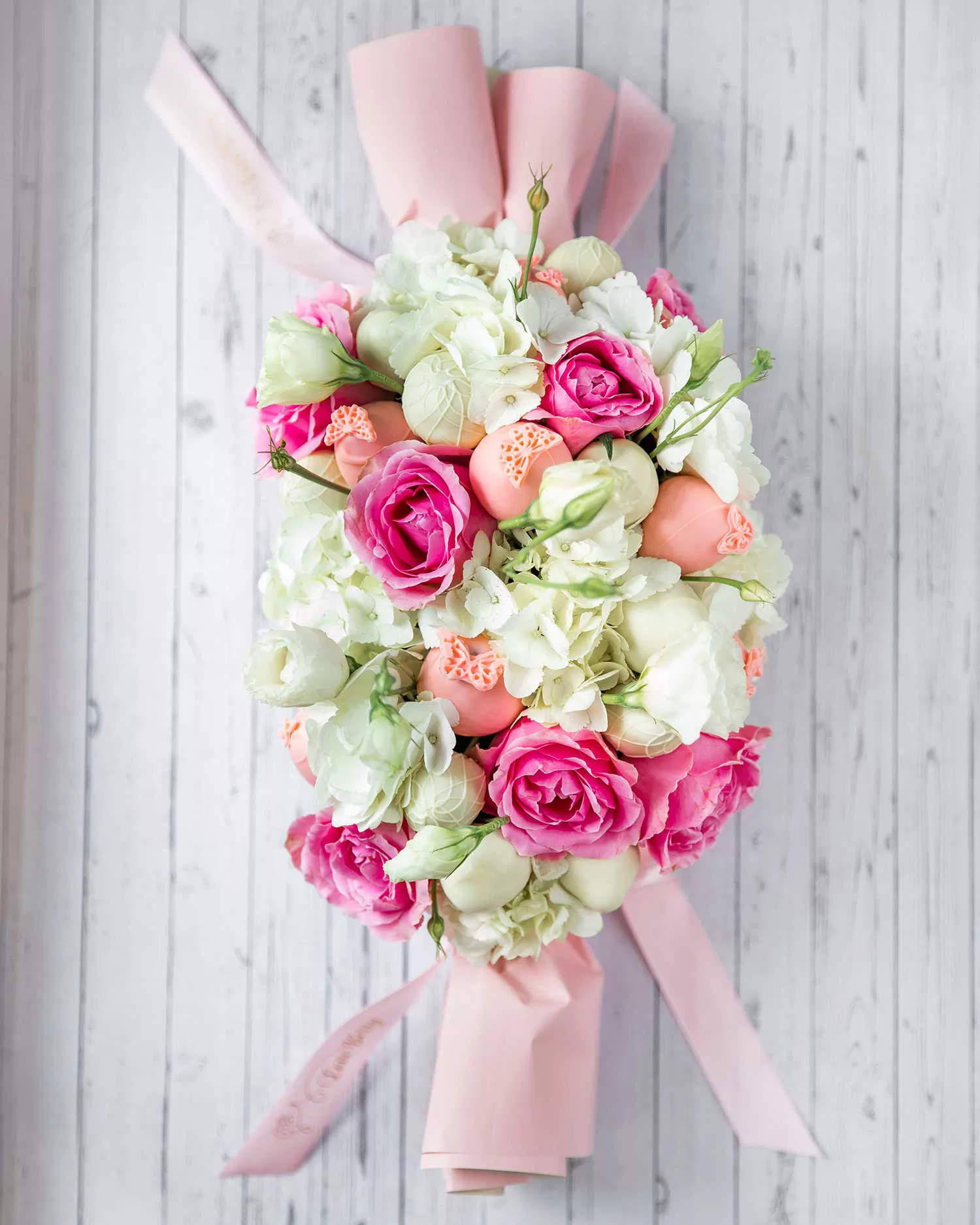 pink roses and chocolate covered strawberries