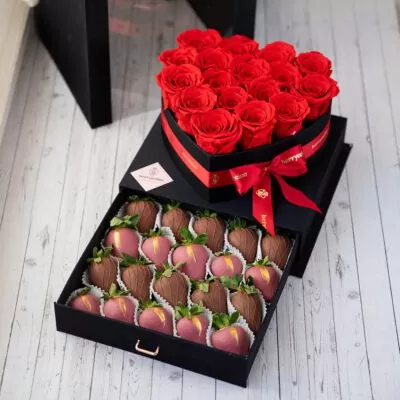 chocolate covered strawberry with red roses
