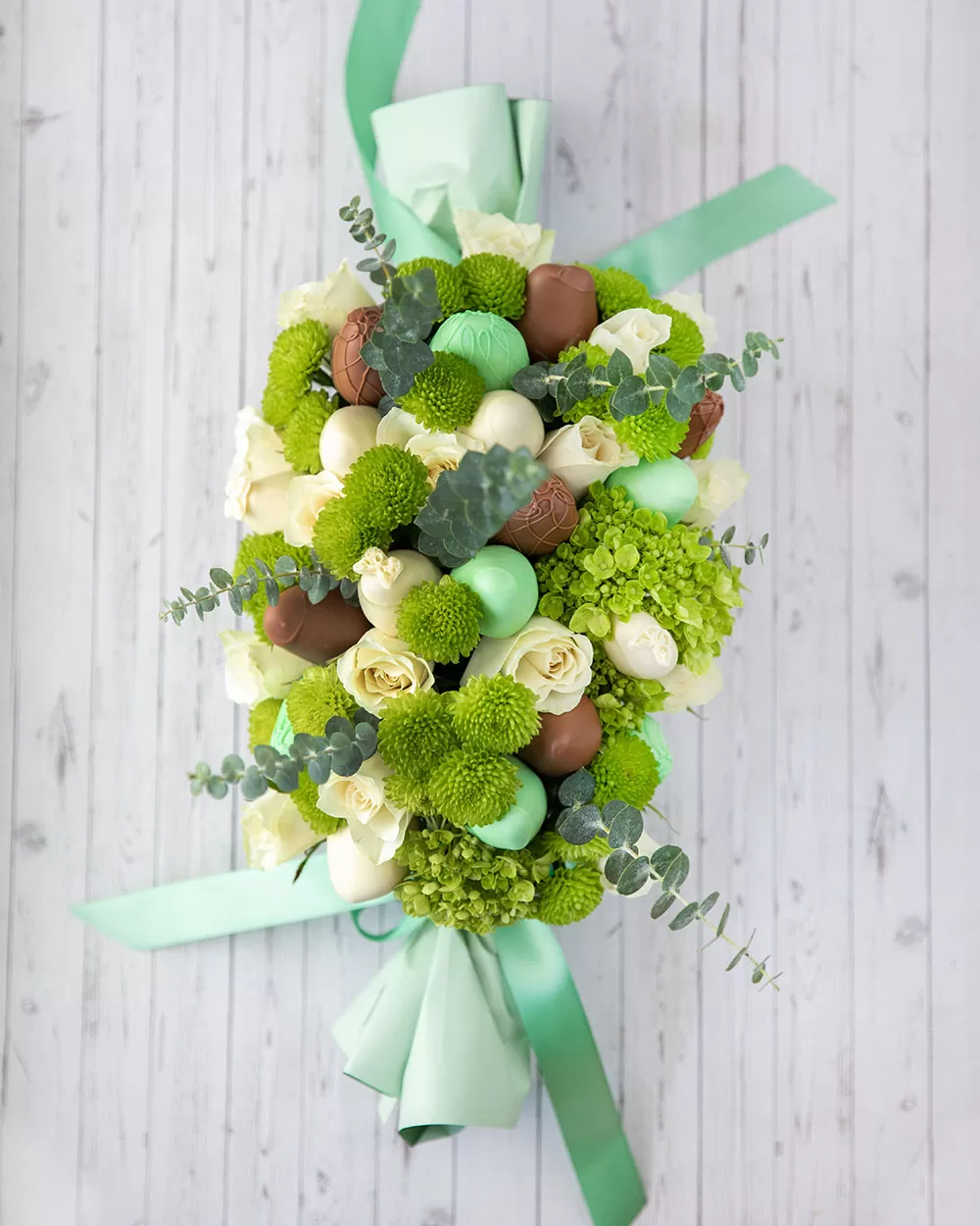 green chocolate covered strawberry arrangement
