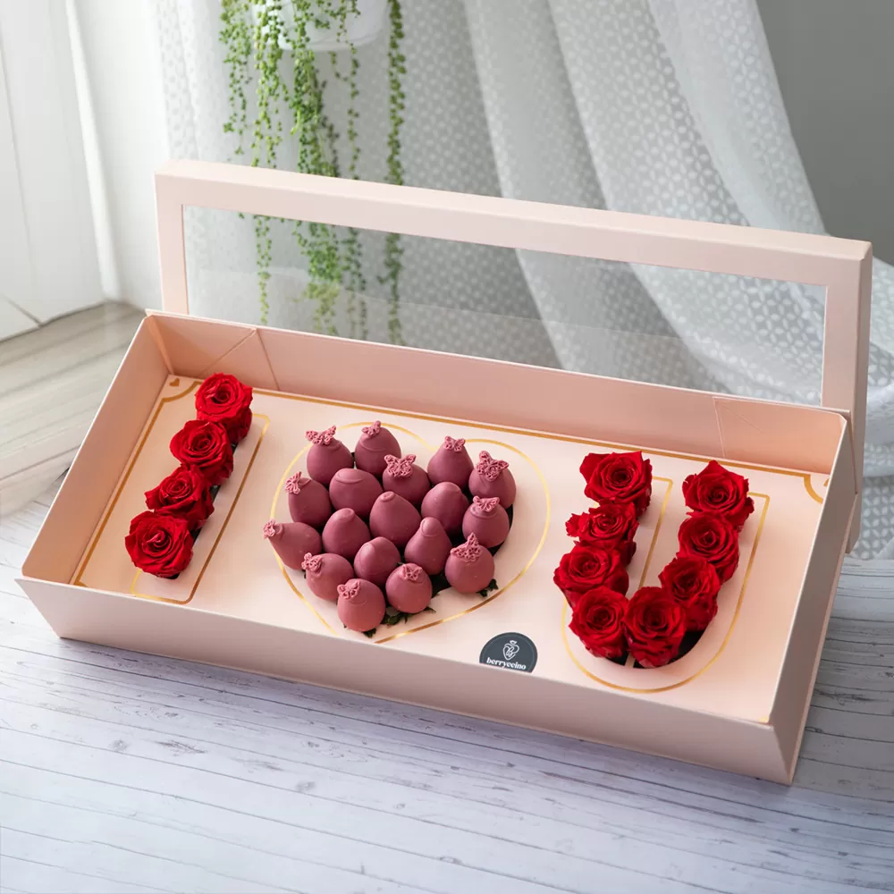 red roses with ruby chocolate covered strawberry arrangements