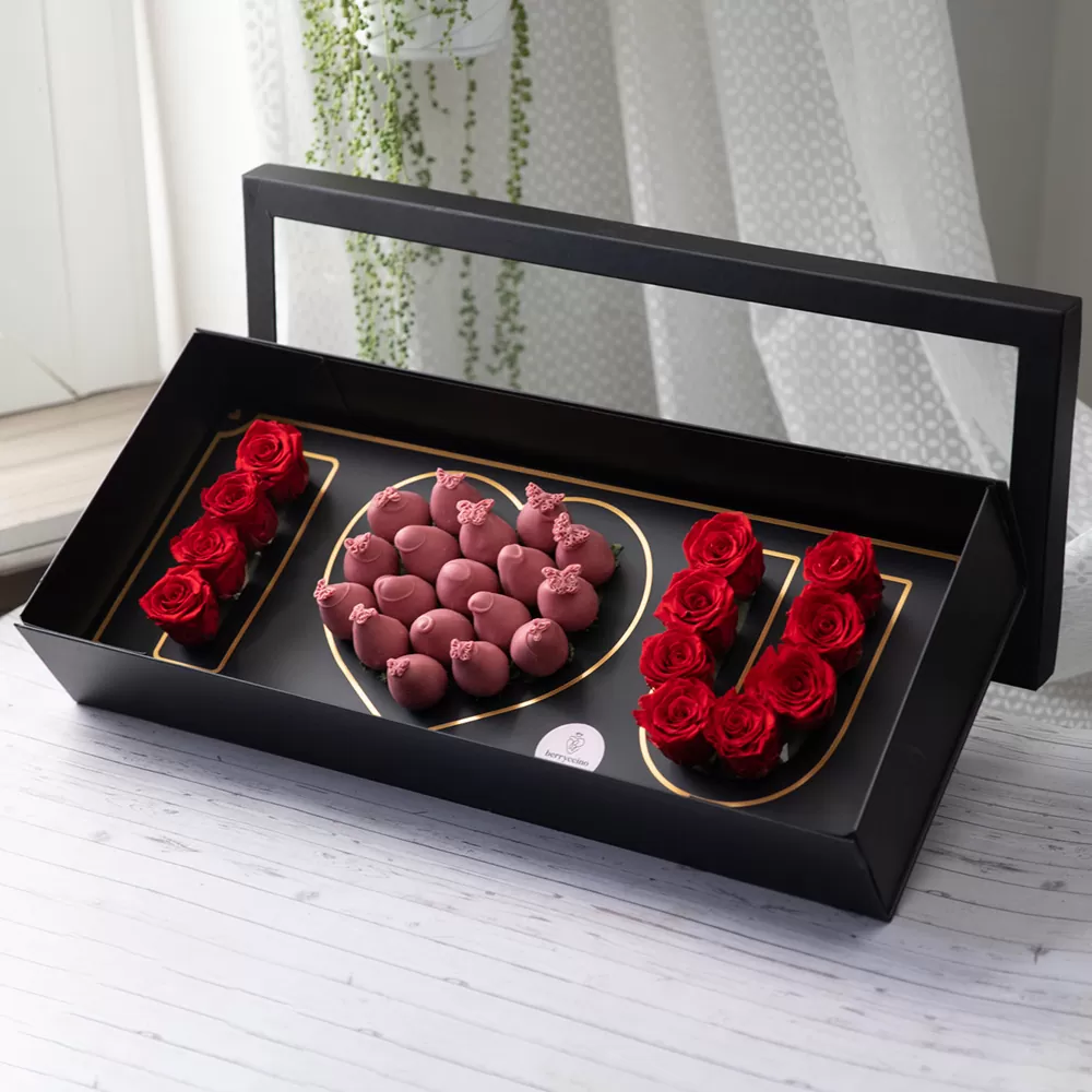 roses with ruby chocolate covered strawberry arrangements