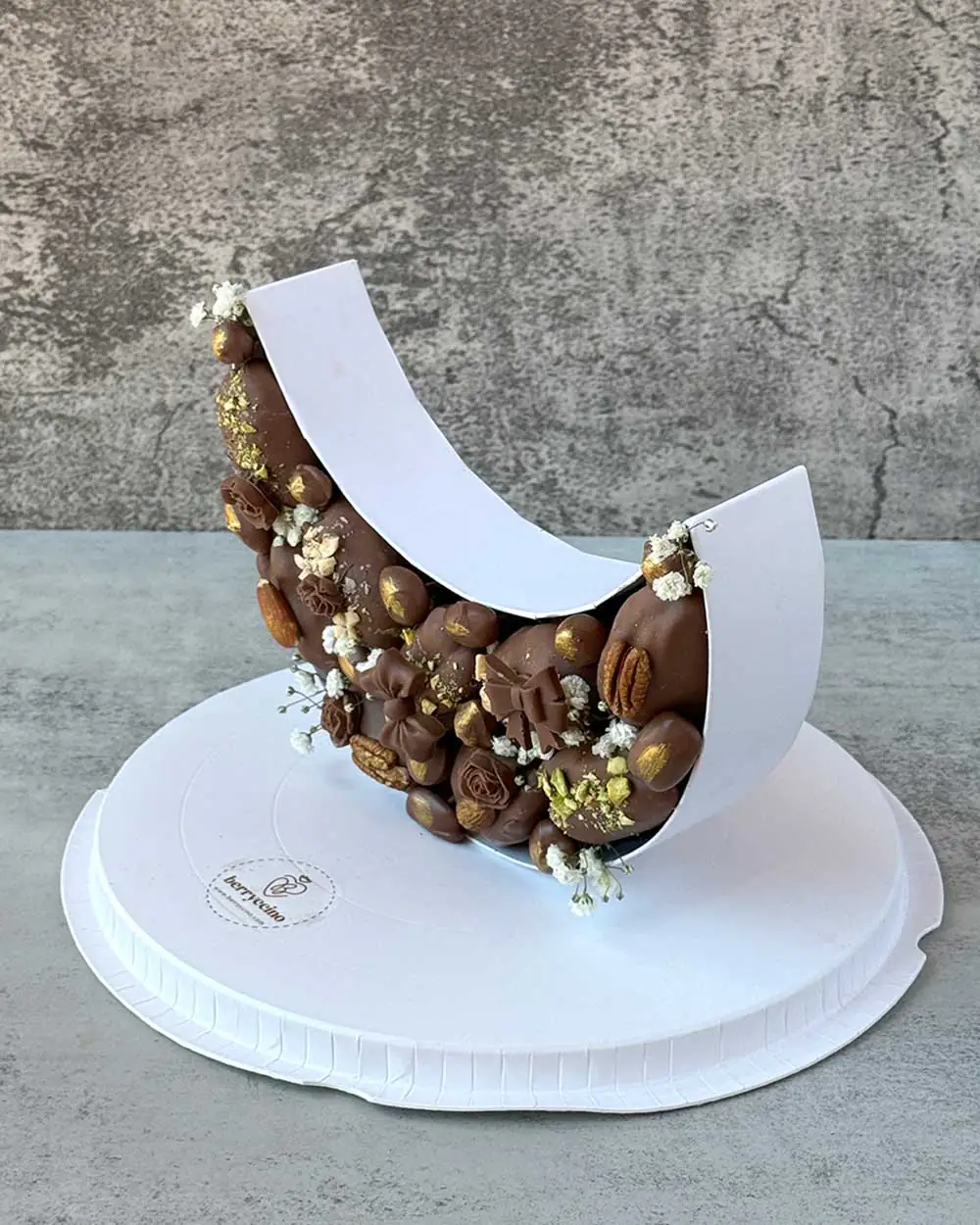 Premium Ramadan Iftar sweets gift set with a crescent moon box, chocolate-covered dates, nuts, and an elegant lantern.