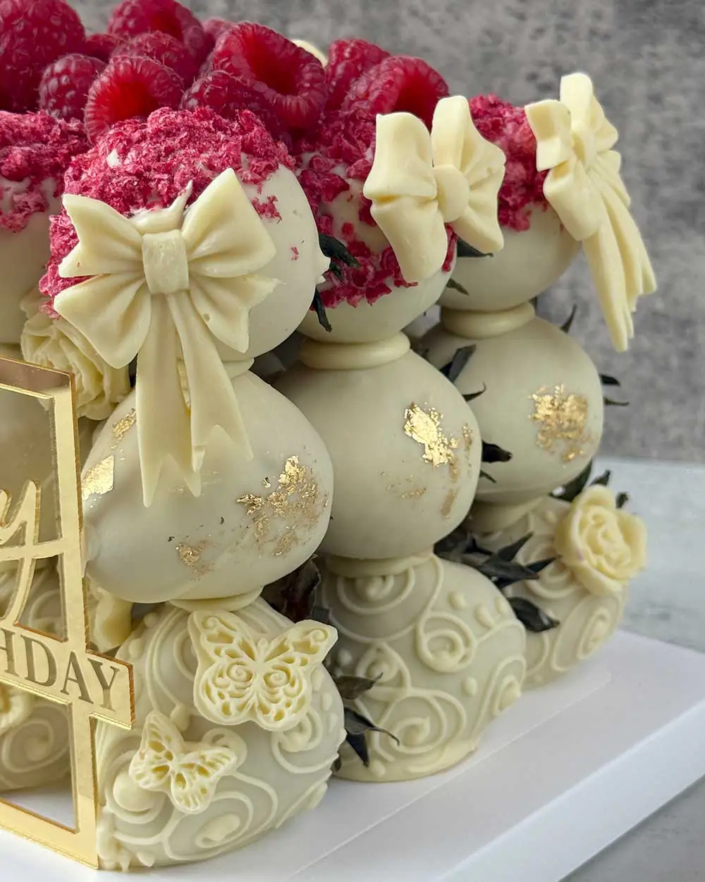 Lambeth-style cake with Belgian chocolate-covered strawberries and raspberries