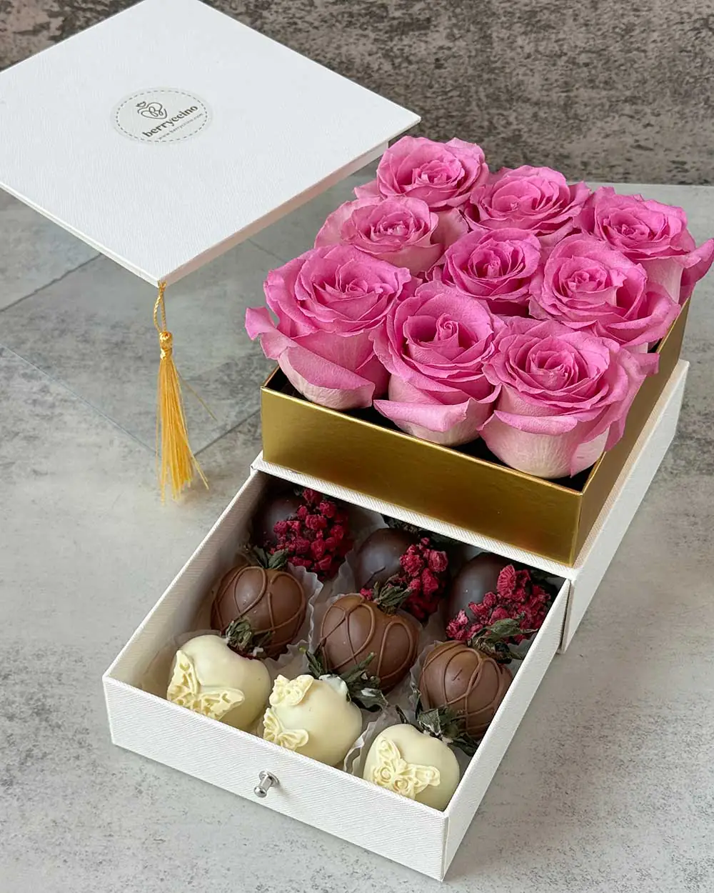 Luxury graduation arrangement with roses and hidden strawberry drawer